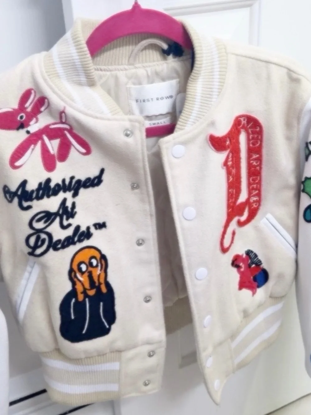 Kids' Cream Varsity Jacket with Colorful Patches